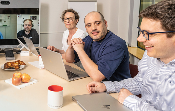 Several people in a video meeting